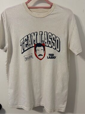 Cream Colored “Team Lasso” Ted Lasso Graphic Short-Sleeve Tee